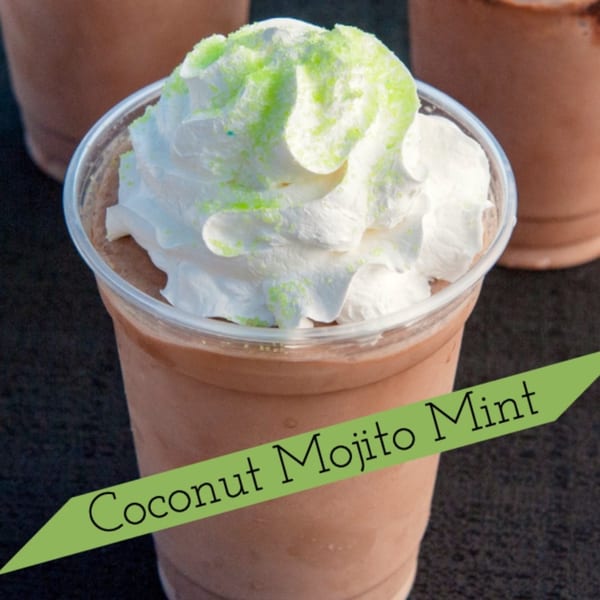 A Chica's Cuban Cafe Coconut Mojito Mint drink with whipped cream and green sprinkles.